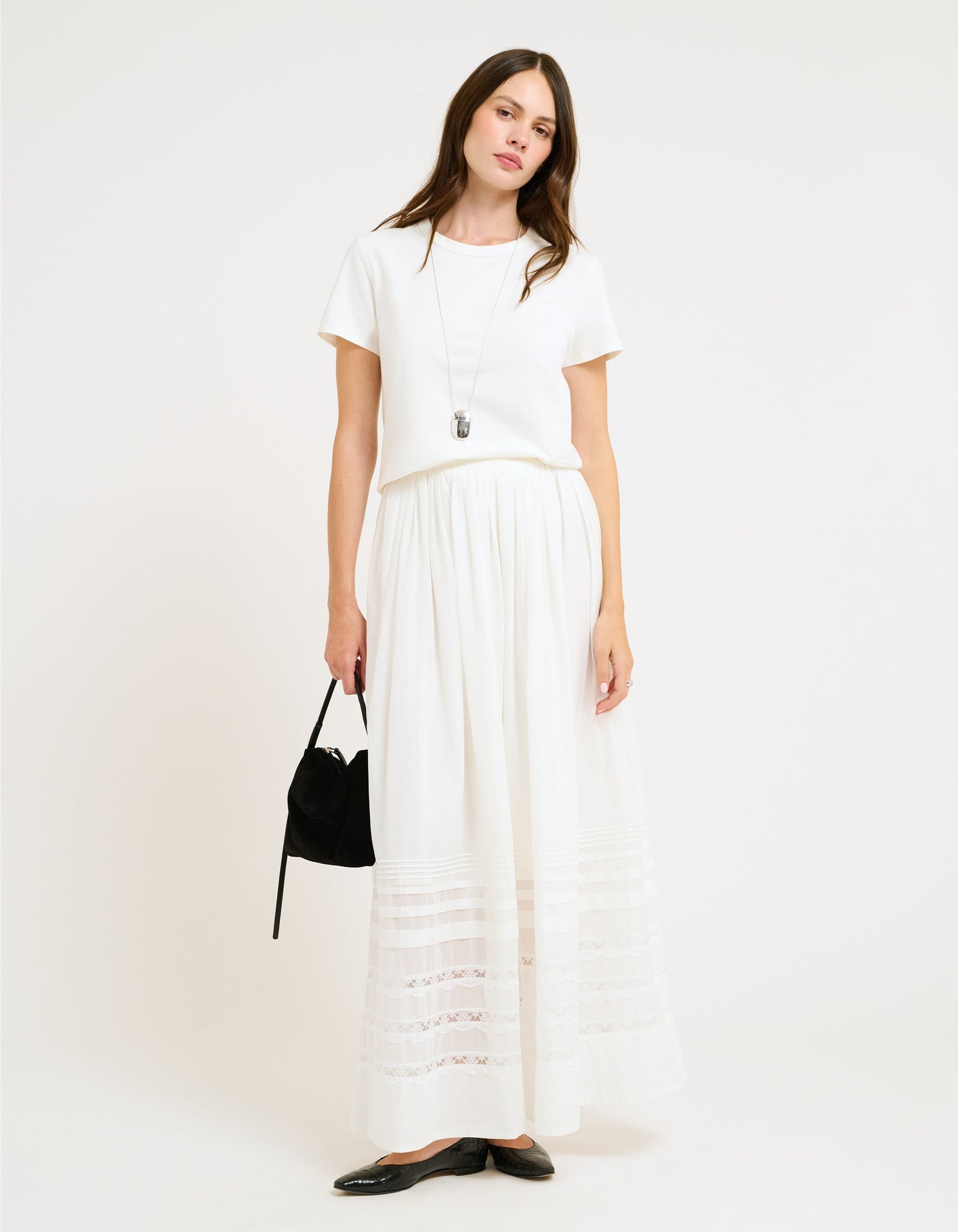 Maxi Skirt with airy cotton voile with pintuck and lace detailing below the knee.
Fully lined