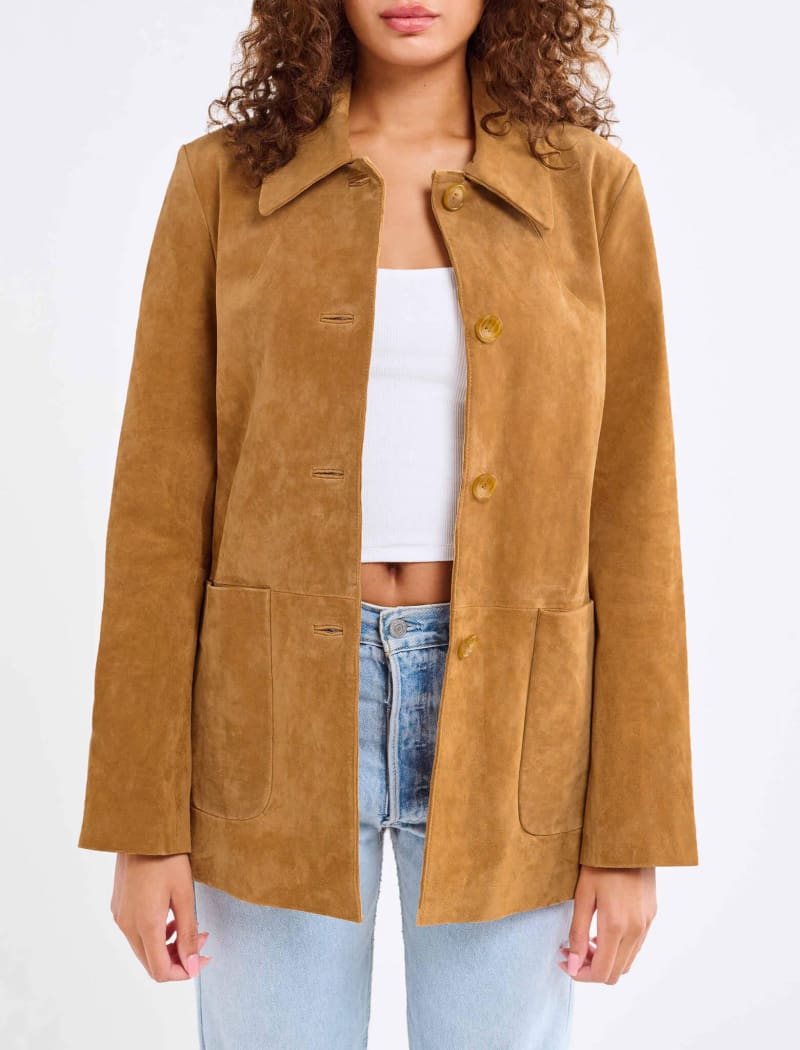 Model wearing genuine suede, vintage-inspired button-up jacket