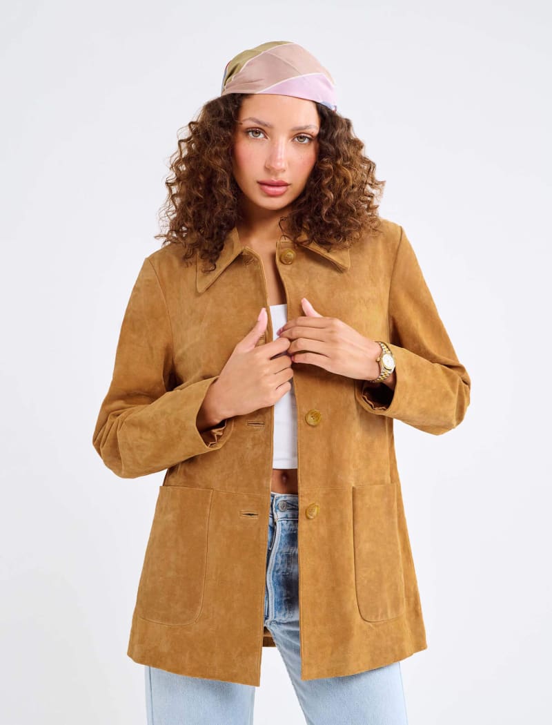 Model wearing genuine suede, vintage-inspired button-up jacket