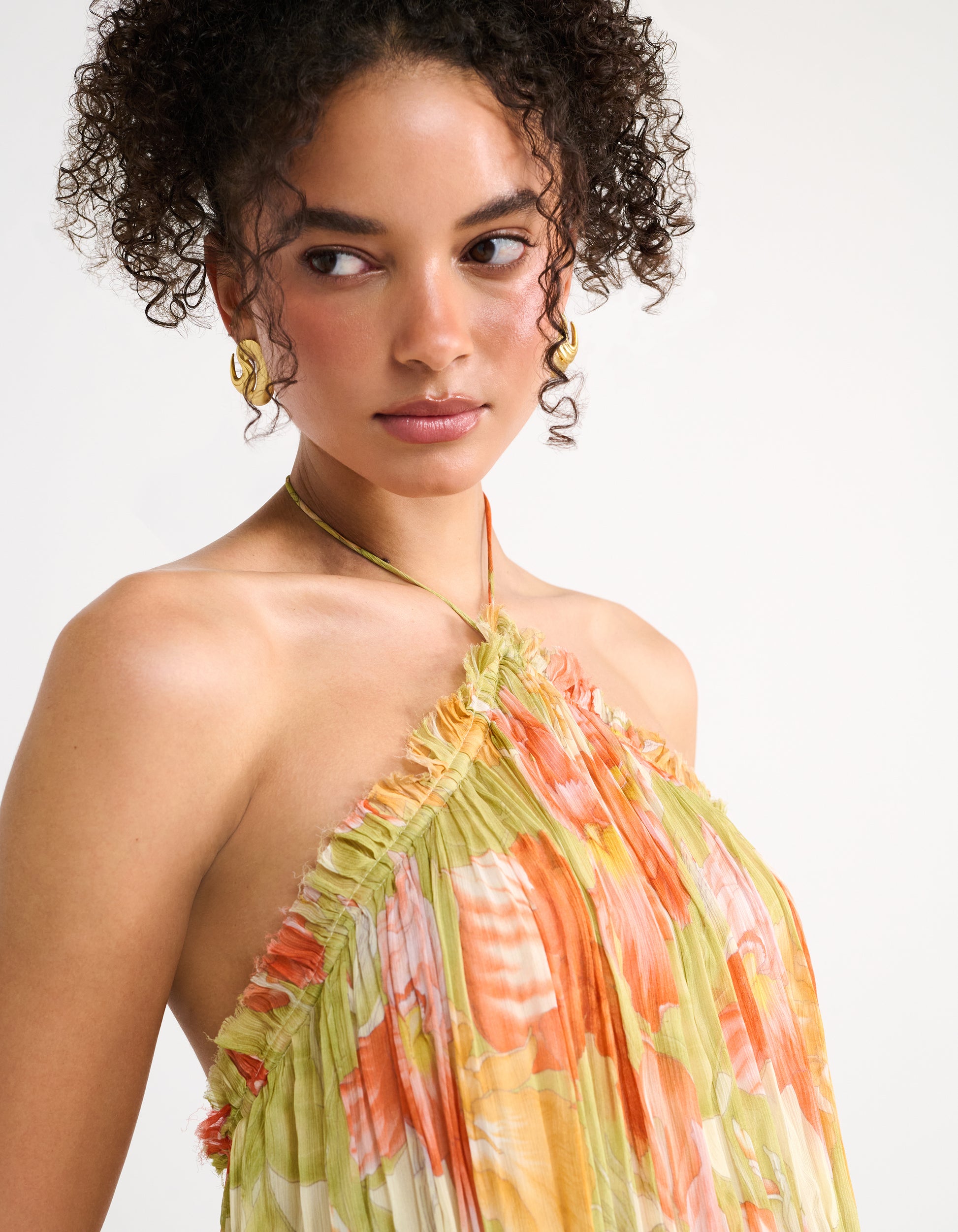 colorful mini dress Let's Celebrate This Roxy mini dress features a chic halter neckline and a vibrant floral print Read Your Mind Mini Dress