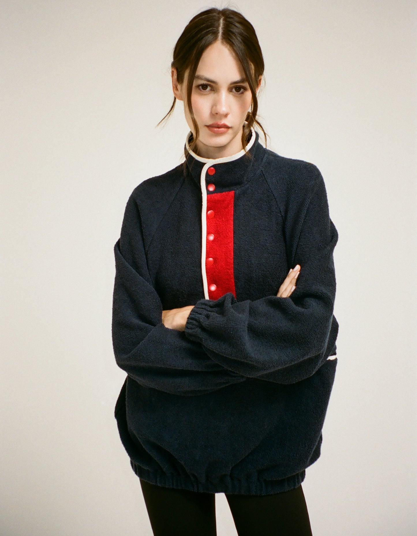 Navy Pullover with snap closures midway down