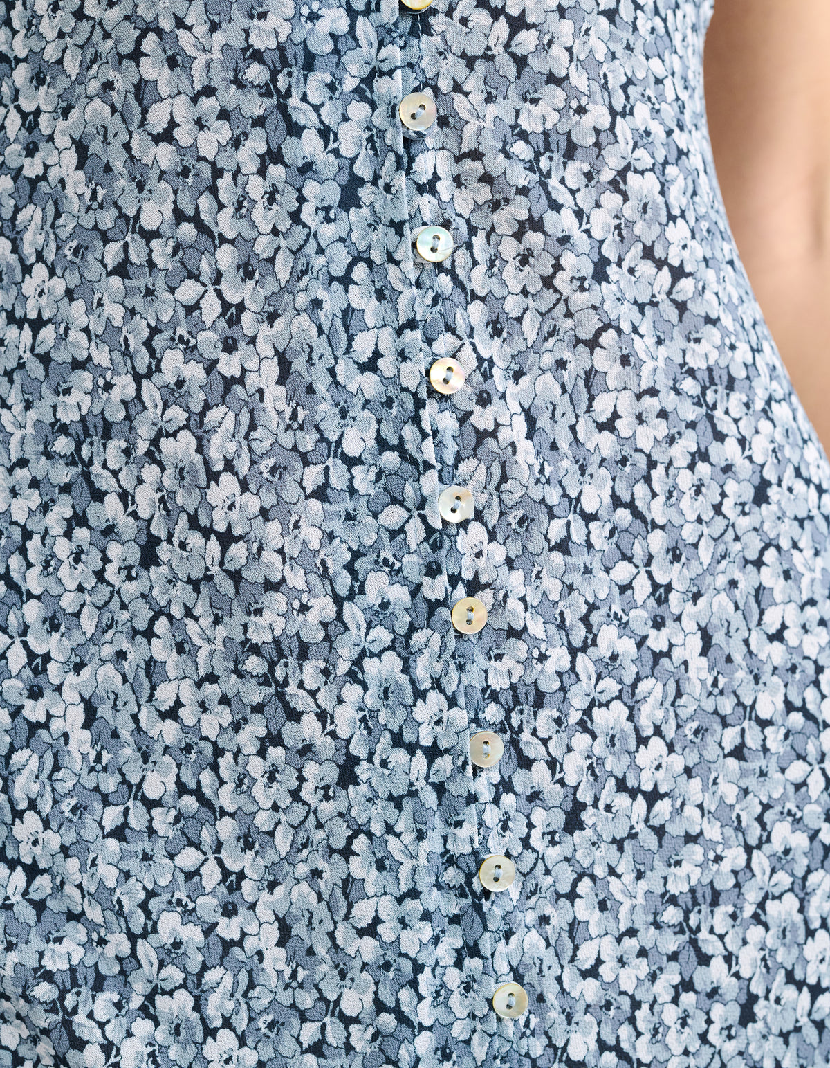Dainty blue and navy floral print with pearl buttons