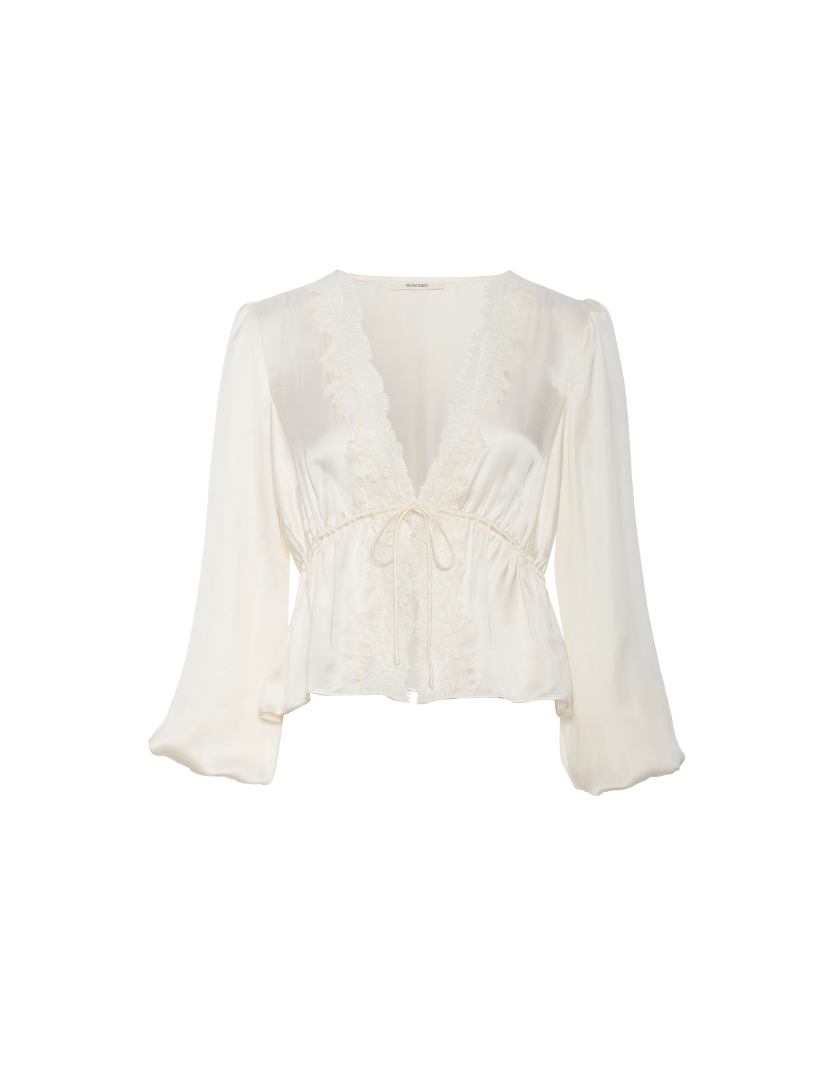 Meadowlark Top in Ivory. An off-white satin long-sleeve blouse with a lace-trimmed V-neckline and a matching drawstring tie at the waist, presented on a solid white background.