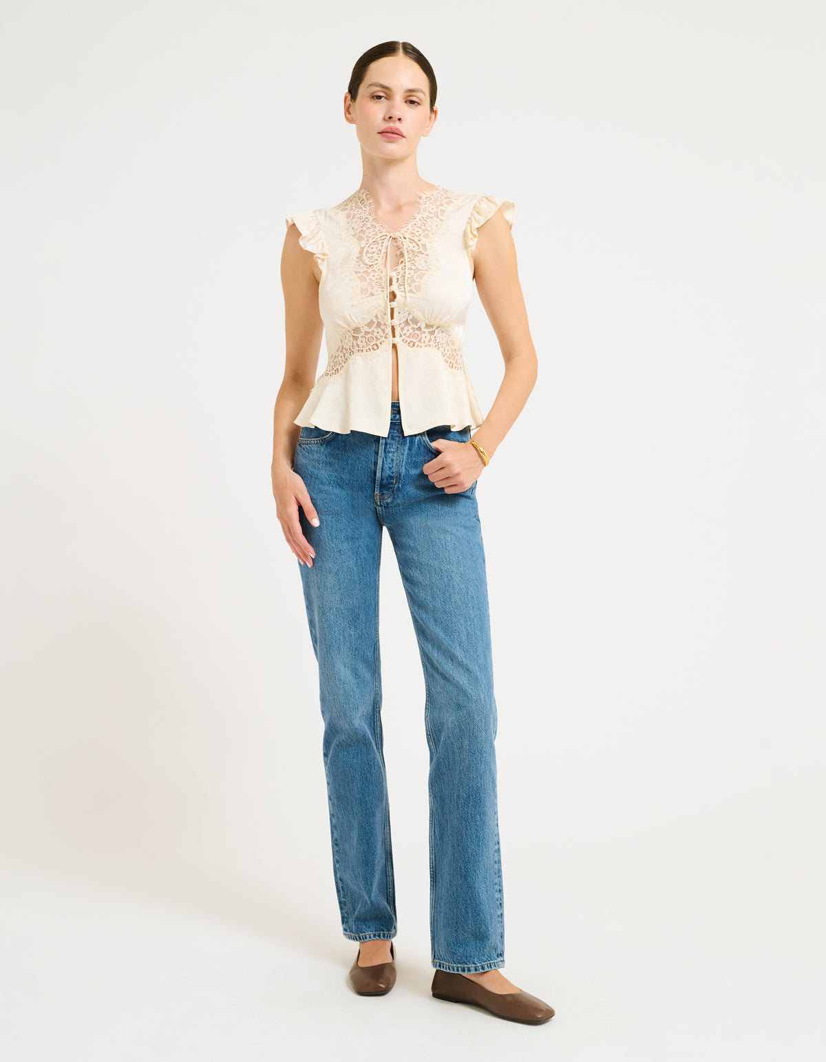 Vintage Inspired Blouse with Fabric covered button up placket and Lace trim.
Ruffle sleeve short sleeve and Micro ties at center front neckline