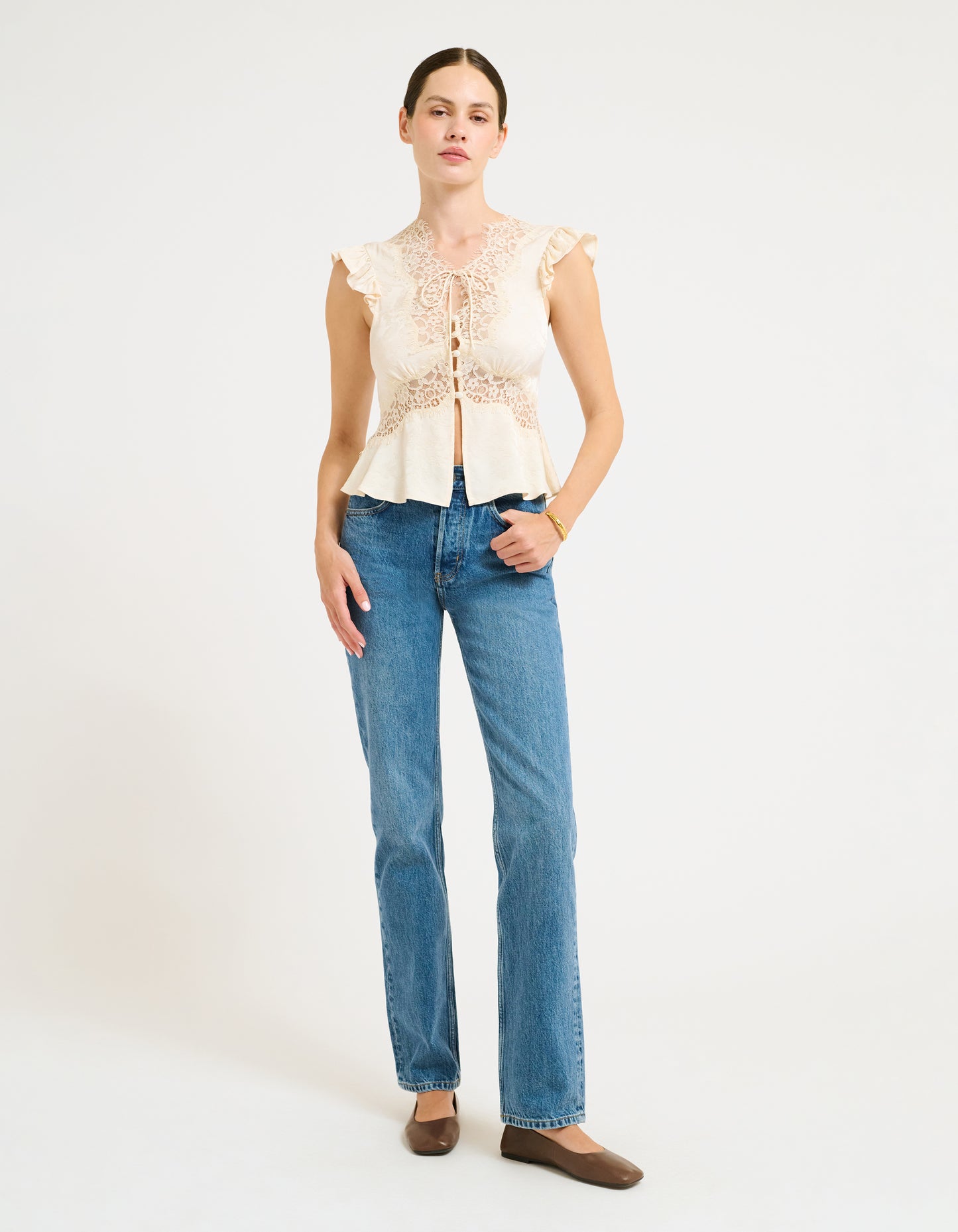 Vintage Inspired Blouse with Fabric covered button up placket and Lace trim.
Ruffle sleeve short sleeve and Micro ties at center front neckline