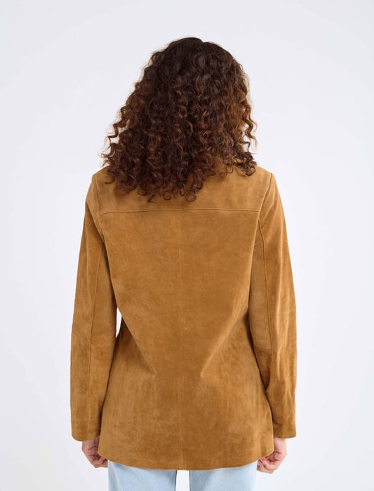 Model wearing genuine suede, vintage-inspired button-up jacket