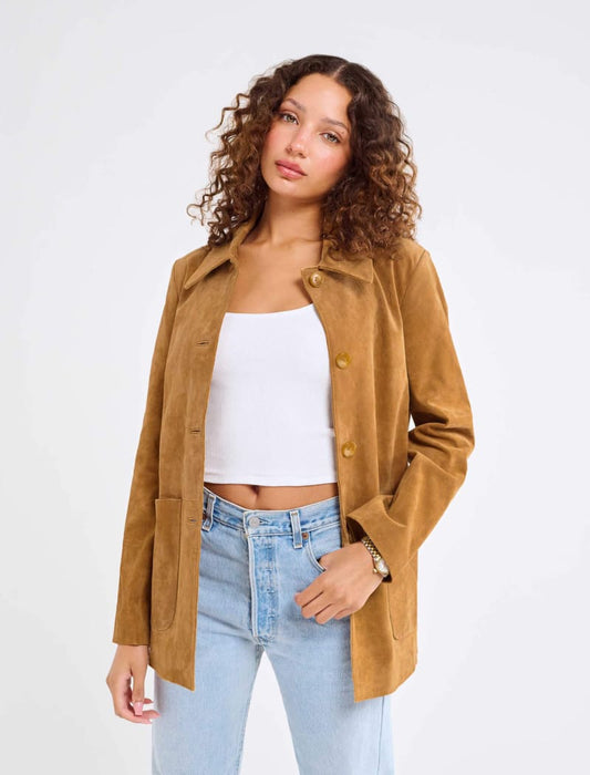 Model wearing genuine suede, vintage-inspired button-up jacket