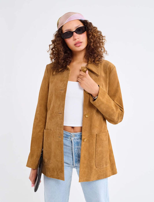 Model wearing genuine suede, vintage-inspired button-up jacket