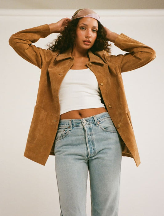 Model wearing genuine suede, vintage-inspired button-up jacket